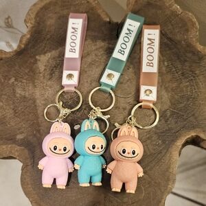 BOOM! Cute Character Labubu Inspired Keychain Set - Pink, Blue, and Tan